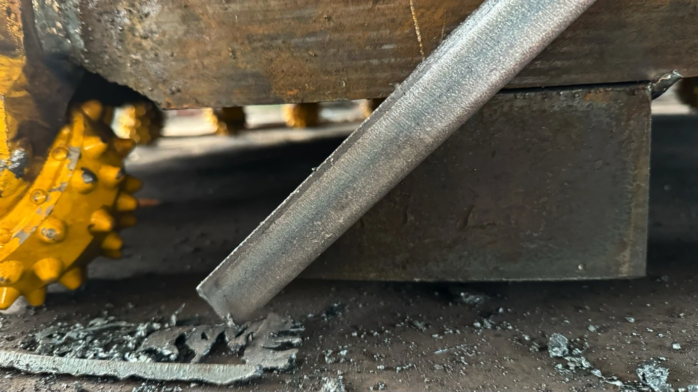 Scraper edge beside a roller bit on the January 2024 core-barrel assembly
